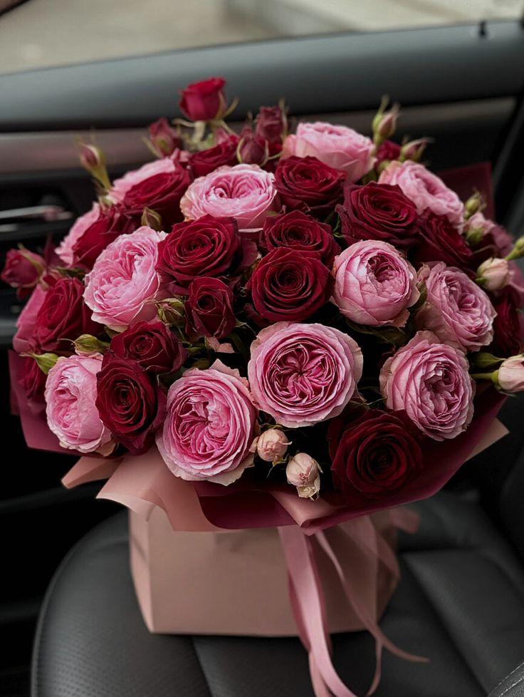 Professional floral arrangement in modern corporate setting